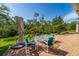 Patio furniture set overlooking the beautiful backyard and tree coverage at 3890 Prairie Reserve Blvd, Orlando, FL 32824