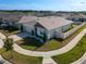An elevated view showcases this lovely home's prime location within a well-planned community with sidewalks at 400 Chayne Pl, St Cloud, FL 34771