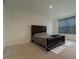Cozy bedroom with neutral carpet, a large window, and recessed lighting at 400 Chayne Pl, St Cloud, FL 34771