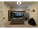 bedroom featuring a gray bunk bed with a desk area, plush carpets, and a large black beanbag at 400 Chayne Pl, St Cloud, FL 34771