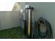 Installed water filtration system on the exterior, along with electrical components, for home utility services at 400 Chayne Pl, St Cloud, FL 34771