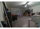 Spacious garage providing ample room for parking and storage with overhead lighting at 400 Chayne Pl, St Cloud, FL 34771