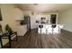 Bright kitchen features stainless appliances, tile backsplash, a pantry, and island with bar stool seating at 400 Chayne Pl, St Cloud, FL 34771