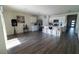 Open kitchen features stainless steel appliances, an island with seating, and modern cabinetry at 400 Chayne Pl, St Cloud, FL 34771