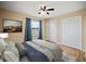 Comfortable bedroom with large closets, a ceiling fan and plenty of natural light at 4091 Lippman Rd, St Cloud, FL 34772