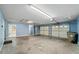Spacious three-car garage with bright lighting, ample storage, and easy access offers convenience and functionality at 4091 Lippman Rd, St Cloud, FL 34772