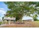 Charming treehouse in backyard for outdoor living and relaxation space at 4091 Lippman Rd, St Cloud, FL 34772