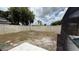 Fenced backyard offering privacy and an open area for outdoor activities and gardening at 414 Otter Creek Dr, Kissimmee, FL 34743