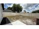 Fenced backyard offering privacy and an open area for outdoor activities and gardening at 414 Otter Creek Dr, Kissimmee, FL 34743