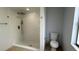 Bathroom featuring tiled shower with rainfall shower head and handheld sprayer at 414 Otter Creek Dr, Kissimmee, FL 34743