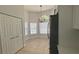 The breakfast nook has a modern chandelier, neutral paint, and windows with coverings at 414 Otter Creek Dr, Kissimmee, FL 34743