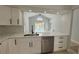 Bright kitchen featuring stainless steel appliances and view of the pool at 414 Otter Creek Dr, Kissimmee, FL 34743