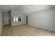 The expansive living room features an open floor plan that provides great natural light and space at 414 Otter Creek Dr, Kissimmee, FL 34743