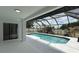 Screen enclosed pool with access to the backyard and open outdoor space at 414 Otter Creek Dr, Kissimmee, FL 34743
