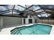 Lovely screened-in pool and white deck, perfect for cooling off and relaxing outdoors at 414 Otter Creek Dr, Kissimmee, FL 34743