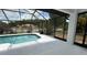 Well maintained screened in pool with a big patio, great for outdoor activities and relaxation at 414 Otter Creek Dr, Kissimmee, FL 34743