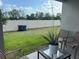 Backyard with views of the fence line, some chairs, a table and a planter at 4373 Deleon St, Haines City, FL 33844
