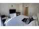 Comfortable bedroom with TV and dresser at 4373 Deleon St, Haines City, FL 33844