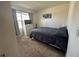 Cozy bedroom featuring a window and dresser with TV on top at 4373 Deleon St, Haines City, FL 33844