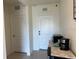 Hallway area featuring modern kitchen appliances and a counter for convenience at 4373 Deleon St, Haines City, FL 33844