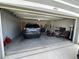 Two car garage with a parked SUV and plenty of room for storage and equipment at 4373 Deleon St, Haines City, FL 33844