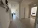 Open hallway leads to a living room and bedroom at 4373 Deleon St, Haines City, FL 33844