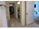Hallway showcasing access to the closet and bathroom at 4373 Deleon St, Haines City, FL 33844