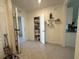 Hallway with closet and view into kitchen area at 4373 Deleon St, Haines City, FL 33844