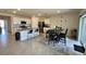 Open concept kitchen with a large island, granite countertops, and stainless steel appliances at 4373 Deleon St, Haines City, FL 33844