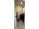 Functional laundry room with black washer and dryer at 4373 Deleon St, Haines City, FL 33844