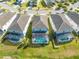 Aerial view of properties and private pools within a gated community at 438 Marcello Blvd, Kissimmee, FL 34746