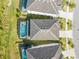 An aerial view highlighting the property's backyard pool and patio at 438 Marcello Blvd, Kissimmee, FL 34746
