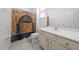 Bathroom with tile flooring, modern vanity, and a shower with a Platform 9 3/4-themed curtain at 438 Marcello Blvd, Kissimmee, FL 34746