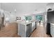 The well-appointed kitchen features a large island and plenty of counter space for culinary enthusiasts at 438 Marcello Blvd, Kissimmee, FL 34746