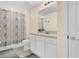 Bathroom features a single vanity and a shower-tub combo, creating a functional and clean space at 4542 Cypress Cay Way, Kissimmee, FL 34746