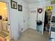 Hallway with closet, bathroom, and decorative details offer ample storage in this charming home at 455 E Palmetto Ave, Longwood, FL 32750