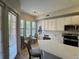 Bright kitchen featuring stainless steel appliances and ample counter space at 501 Mirasol Cir # 203, Celebration, FL 34747