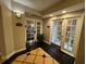 Well-lit lobby area with tiled floors leads to the fitness center and other building amenities at 501 Mirasol Cir # 203, Celebration, FL 34747