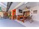 The patio features an outdoor dining table and extra seating area at 5053 Maui Cir # 14, Orlando, FL 32808