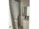 Bathroom featuring vanity, updated fixtures, with a stylish shower, all designed for modern comfort at 5562 Old Tampa Hwy, Davenport, FL 33896