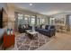 Inviting living room featuring a comfortable seating area and stylish decor at 6086 Broad Oak Dr, Davenport, FL 33837