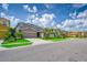 Attractive street view showcasing well-maintained homes with lush green lawns and inviting curb appeal at 6086 Broad Oak Dr, Davenport, FL 33837