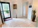 Inviting foyer with tile flooring, decorative accents, and a view of the entryway at 650 Portofino Drive, Poinciana, FL 34759