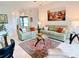 Comfortable living room with decorative accents and an open, airy design, filled with natural light at 650 Portofino Drive, Poinciana, FL 34759
