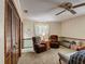 A cozy bedroom features two brown recliners and a ceiling fan for added comfort at 724 Knob Hill Cir, Kissimmee, FL 34744