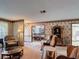 Open-concept living room with easy access to the dining room and updated kitchen at 724 Knob Hill Cir, Kissimmee, FL 34744