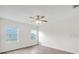 Spacious bedroom featuring laminate flooring and a ceiling fan at 724 Lake Cummings Blvd, Lake Alfred, FL 33850