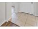 Welcoming entryway showcasing tile flooring and front door at 724 Lake Cummings Blvd, Lake Alfred, FL 33850
