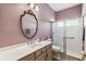 Bathroom featuring a shower, vanity and tile floors at 759 Glendora Rd, Poinciana, FL 34759
