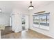Dining area with tile flooring, a large window, and access to the outdoors at 759 Glendora Rd, Poinciana, FL 34759
